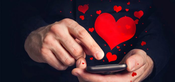 cinta-tangan-sms-whatsapp-smartphone-media-sosial-medsos--750x350