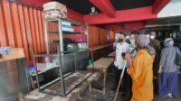 petugas-kelurahan-saat-mendatangi-penjual-nasi-uduk-babi_169